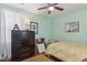 Light and airy bedroom with a full-size bed and dresser at 3817 Honey Ridge Ct, Las Vegas, NV 89135