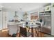 Modern kitchen with white cabinets, stainless steel appliances, and an island at 3817 Honey Ridge Ct, Las Vegas, NV 89135