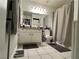 Clean bathroom, featuring a granite vanity and shower/tub combo at 4050 Pacific Harbors Dr # 133, Las Vegas, NV 89121