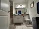 Clean bathroom, featuring a granite vanity and shower/tub combo at 4050 Pacific Harbors Dr # 133, Las Vegas, NV 89121