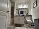 Clean bathroom, featuring a granite vanity and shower/tub combo at 4050 Pacific Harbors Dr # 133, Las Vegas, NV 89121