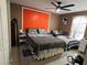 Spacious bedroom with king-size bed and twin bed, ceiling fan at 4050 Pacific Harbors Dr # 133, Las Vegas, NV 89121