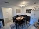 Bright dining area with table and chairs, adjacent to kitchen at 4050 Pacific Harbors Dr # 133, Las Vegas, NV 89121