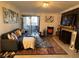 Living room featuring comfortable seating and a fireplace at 4050 Pacific Harbors Dr # 133, Las Vegas, NV 89121