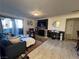 Bright and airy living room with fireplace and patio access at 4050 Pacific Harbors Dr # 133, Las Vegas, NV 89121