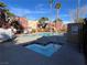 Community pool and spa area with surrounding landscaping at 4050 Pacific Harbors Dr # 133, Las Vegas, NV 89121