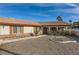 House exterior showcasing brick accents and drought-tolerant landscaping at 4454 Harmony Ct, Las Vegas, NV 89121