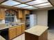 Bright kitchen, featuring ample cabinetry and an island at 4454 Harmony Ct, Las Vegas, NV 89121