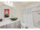 Clean bathroom with shower/tub combo and modern vanity at 7192 Polita Ct, Las Vegas, NV 89156
