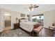 Spacious bedroom with mountain views and ensuite bathroom access at 7192 Polita Ct, Las Vegas, NV 89156