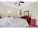 Cozy bedroom with a sleigh bed, dresser, and red nightstand at 7192 Polita Ct, Las Vegas, NV 89156