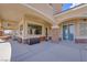 Ground floor patio with large windows and doors at 7192 Polita Ct, Las Vegas, NV 89156