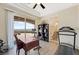 Home office with a view, treadmill, and built-in shelving at 7192 Polita Ct, Las Vegas, NV 89156