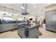 Gourmet kitchen boasting a large island and stunning views at 7192 Polita Ct, Las Vegas, NV 89156
