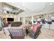 Open living area with a view into the kitchen and bar area at 7192 Polita Ct, Las Vegas, NV 89156