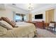 Spacious main bedroom with large bed, mountain views, and a walk-in closet at 7192 Polita Ct, Las Vegas, NV 89156