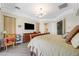 Main bedroom with king-size bed and views of the surrounding landscape at 7192 Polita Ct, Las Vegas, NV 89156