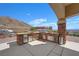 Outdoor kitchen with stainless steel appliances at 7192 Polita Ct, Las Vegas, NV 89156