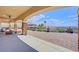 Covered patio with seating area and mountain views at 7192 Polita Ct, Las Vegas, NV 89156