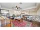 Second-floor sitting area with wet bar, and balcony access at 7192 Polita Ct, Las Vegas, NV 89156