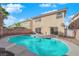 Stunning kidney shaped pool in a private backyard at 7640 Ribbon Garland Ct, Las Vegas, NV 89139