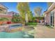 Spacious backyard oasis with a sparkling pool and spa at 7937 Base Camp Ave, Las Vegas, NV 89178