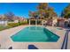 Inviting community pool and spa with covered seating at 7976 Harbour Towne Ave, Las Vegas, NV 89113