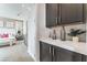 Main bedroom features a vanity with dark cabinets at 10262 Super Jovian St, Las Vegas, NV 89143