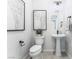 Stylish powder room with pedestal sink and modern fixtures at 10262 Super Jovian St, Las Vegas, NV 89143