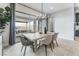 Bright dining room with sliding glass doors to backyard at 10262 Super Jovian St, Las Vegas, NV 89143