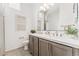 Bathroom with double vanity, marble countertops, and modern fixtures at 10270 Super Jovian St, Las Vegas, NV 89143