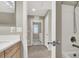 Bathroom with access to laundry room at 10597 Painted Bridge St, Las Vegas, NV 89179