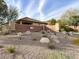 Community entrance of Talavera with desert landscaping and brick wall at 10597 Painted Bridge St, Las Vegas, NV 89179