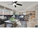 Open living room with a view into the kitchen area at 10597 Painted Bridge St, Las Vegas, NV 89179