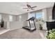 Spacious loft area with a treadmill and plenty of natural light at 10597 Painted Bridge St, Las Vegas, NV 89179