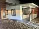 Night view of updated home with new siding and landscaping at 116 W Victory Rd, Henderson, NV 89015