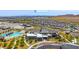 Stunning aerial view showcasing Las Vegas Strip in the distance with community amenities nearby at 12457 Heritage Bend Dr, Las Vegas, NV 89138