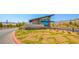 Beautiful view of the entrance to Heritage at Stonebridge with well-manicured landscaping and architectural detail at 12457 Heritage Bend Dr, Las Vegas, NV 89138