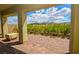 Covered patio featuring a brick floor with beautiful mountain views, perfect for outdoor relaxation and entertaining at 12457 Heritage Bend Dr, Las Vegas, NV 89138