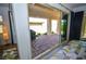 Covered patio with stone pavers, offering ample room for outdoor entertaining at 12457 Heritage Bend Dr, Las Vegas, NV 89138