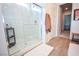 Modern glass-enclosed shower with sleek hardware and a clean, bright aesthetic at 12457 Heritage Bend Dr, Las Vegas, NV 89138