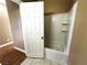 Simple bathroom with tub and tiled shower surround at 1350 Crystal Hill Ln # 3, Henderson, NV 89012