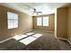 Spacious bedroom with ceiling fan and neutral carpet at 1350 Crystal Hill Ln # 3, Henderson, NV 89012