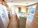 Kitchen features a breakfast bar and modern appliances at 1350 Crystal Hill Ln # 3, Henderson, NV 89012