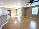 Living room with hardwood floors, sliding doors to patio at 1350 Crystal Hill Ln # 3, Henderson, NV 89012