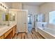 Bathroom boasts double sinks, shower, and bathtub at 1605 Calle Montery St, Las Vegas, NV 89117