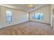 Large bedroom featuring a window with blinds and carpet at 1605 Calle Montery St, Las Vegas, NV 89117