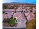 Aerial view of a single-Gathering home with a large backyard and a swimming pool at 1613 Shadow Rock Dr, Las Vegas, NV 89117