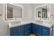 Modern bathroom featuring a double vanity with marble countertop at 1613 Shadow Rock Dr, Las Vegas, NV 89117