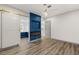 Bright bedroom with barn door, fireplace, and ensuite bathroom at 1613 Shadow Rock Dr, Las Vegas, NV 89117